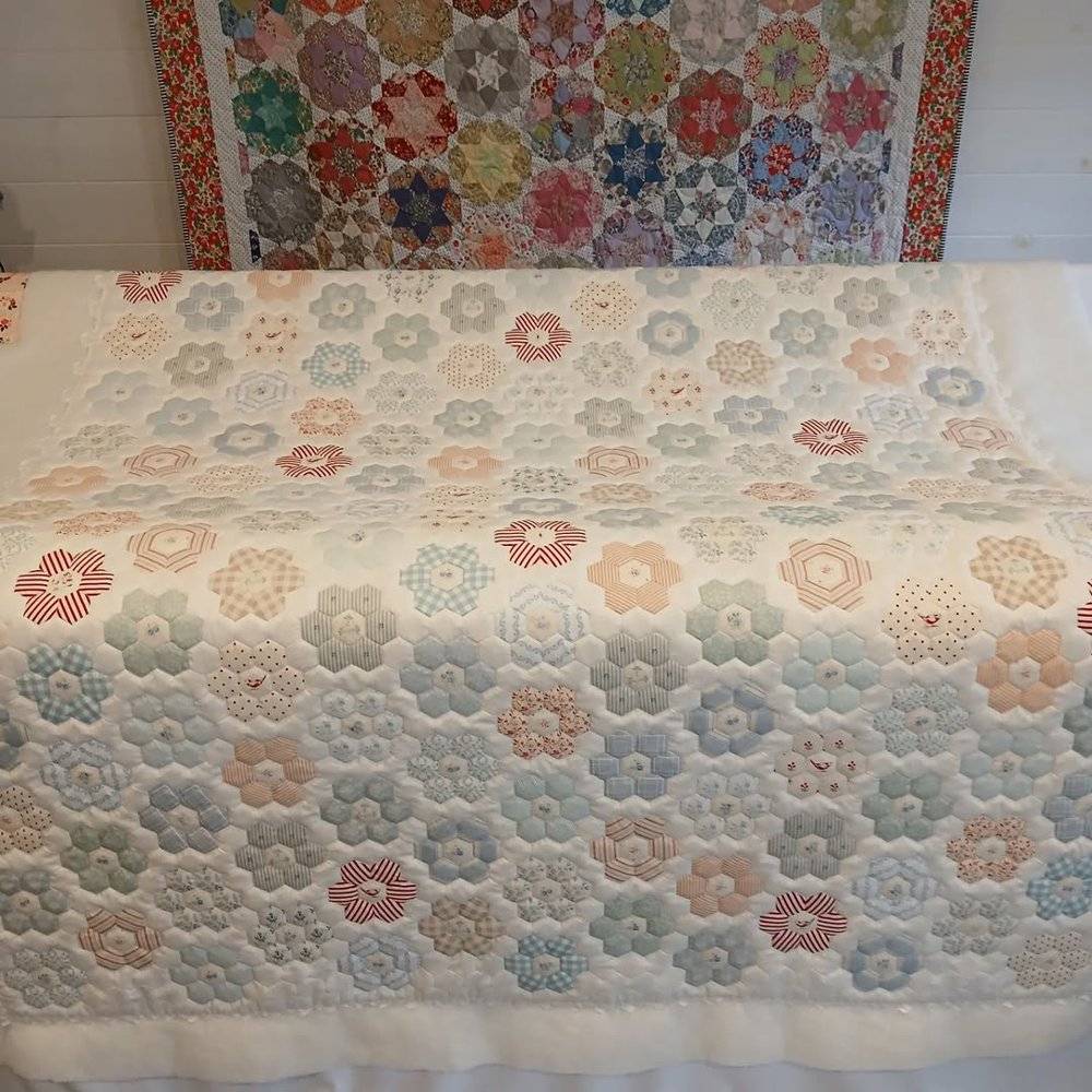 Hexagon Paper Pieced Quilt with Floral Motifs