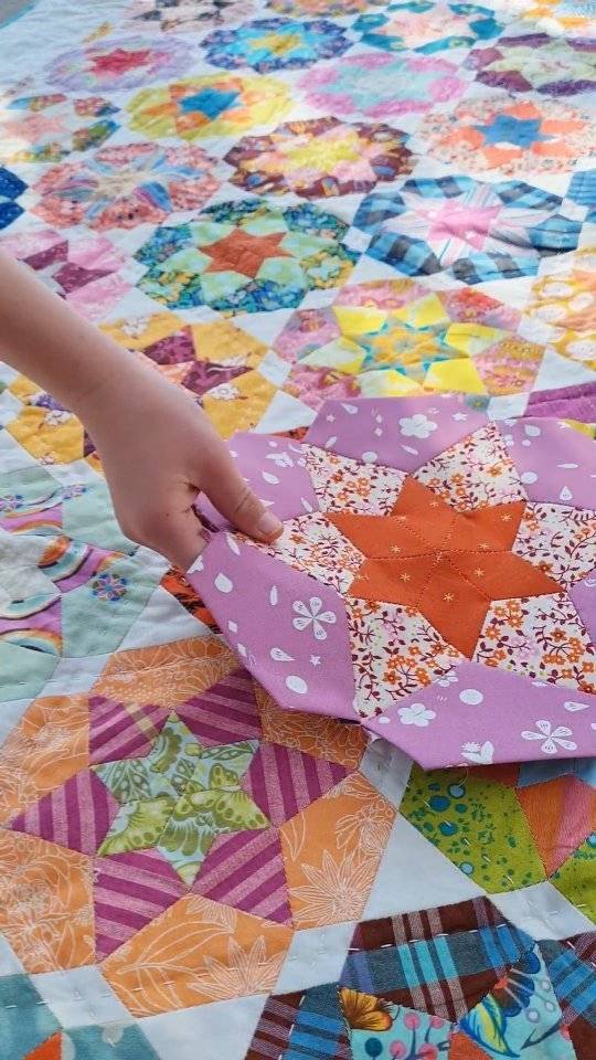 Hexagonal Paper Pieced Quilt with Star Centers