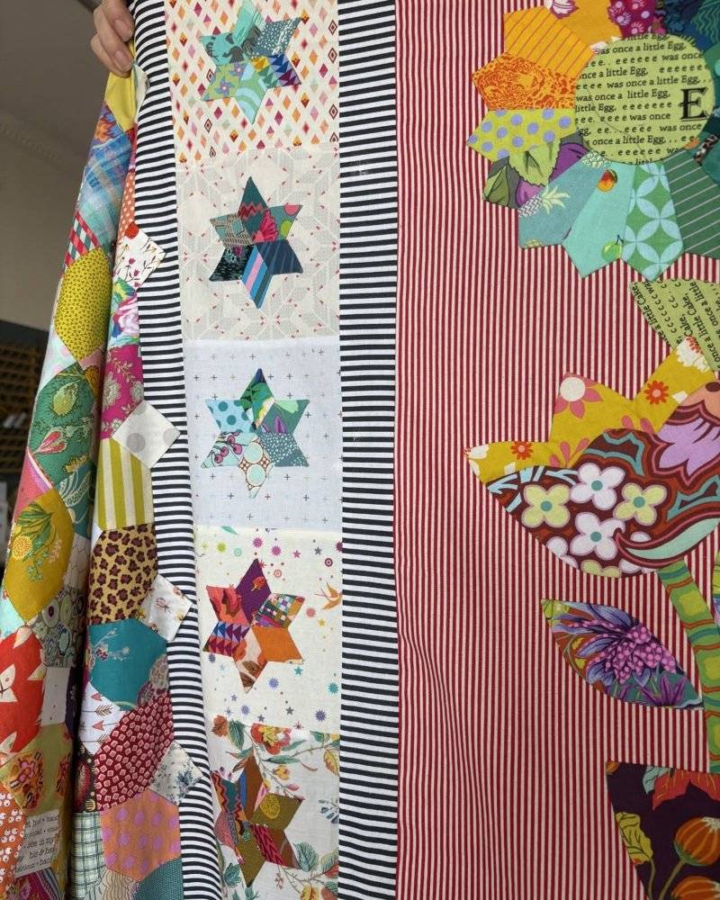 Paper Pieced Eden Quilt with Star and Flower Blocks