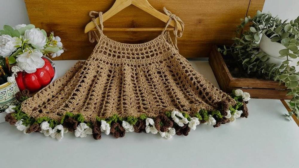 Whimsical Crochet Dress with Floral Hem