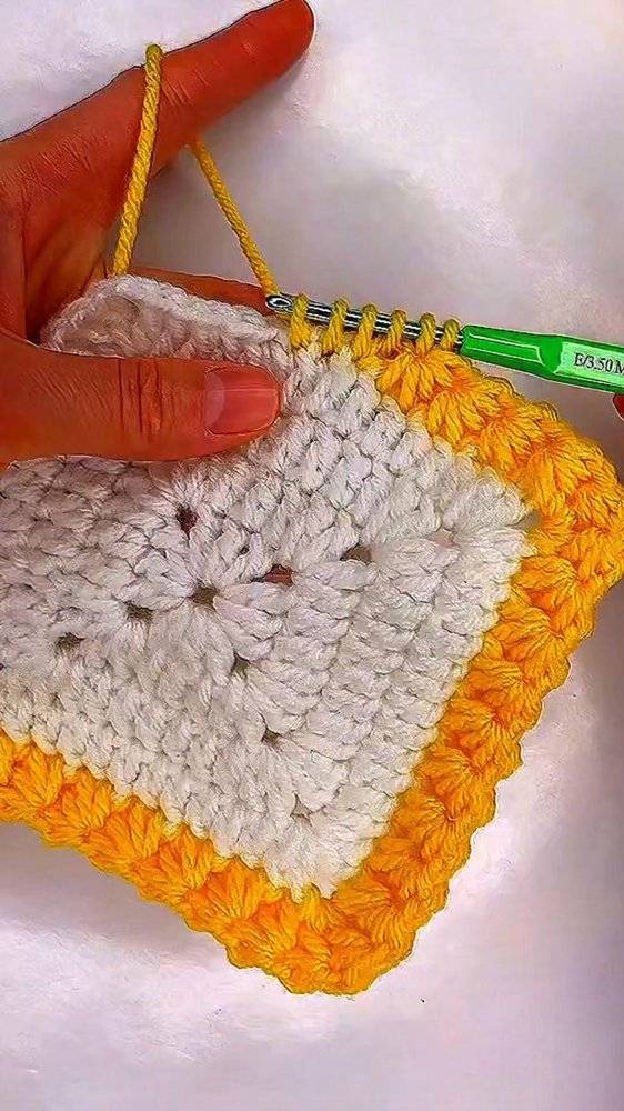 Classic White and Yellow Granny Square Crochet Project