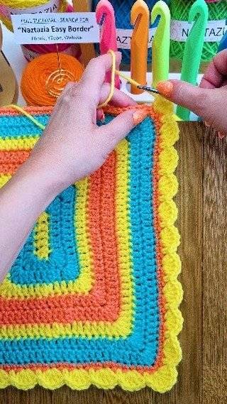 Colorful Striped Crochet Blanket with Scalloped Border