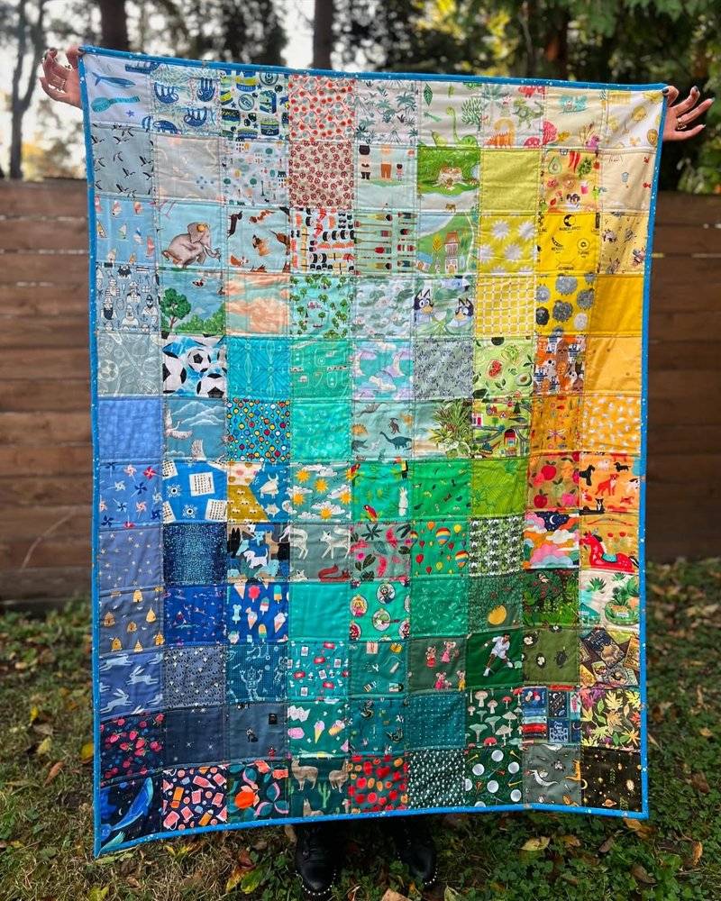 Playful Patchwork Quilt with Whimsical Fabric Scraps