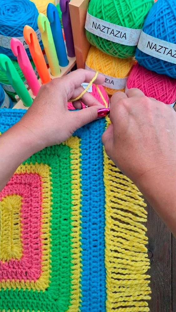 Vibrant Striped Crochet Rug with Fringe