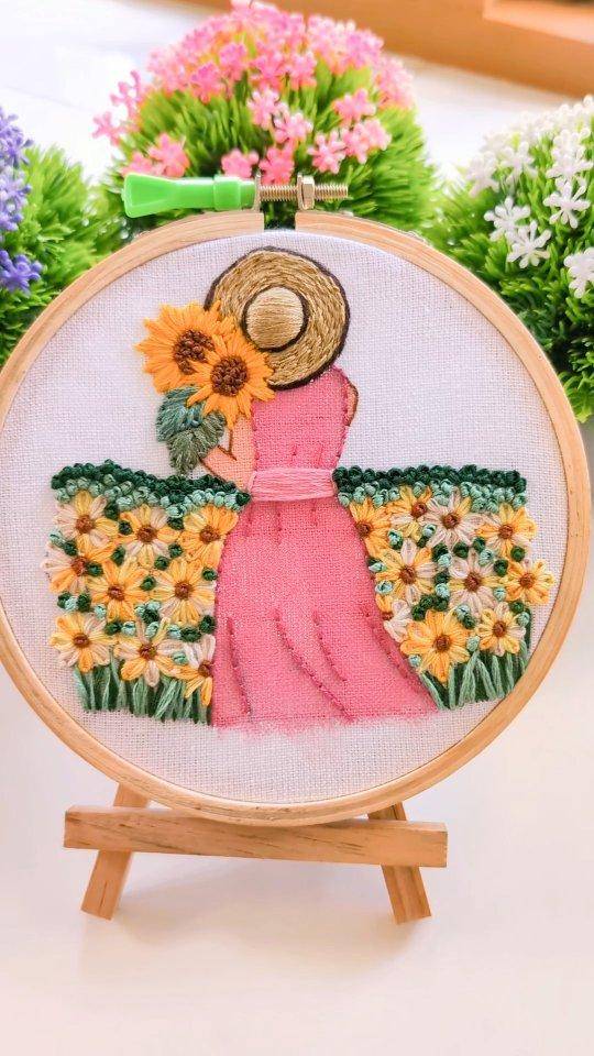 Embroidery of a Girl with Sunflowers