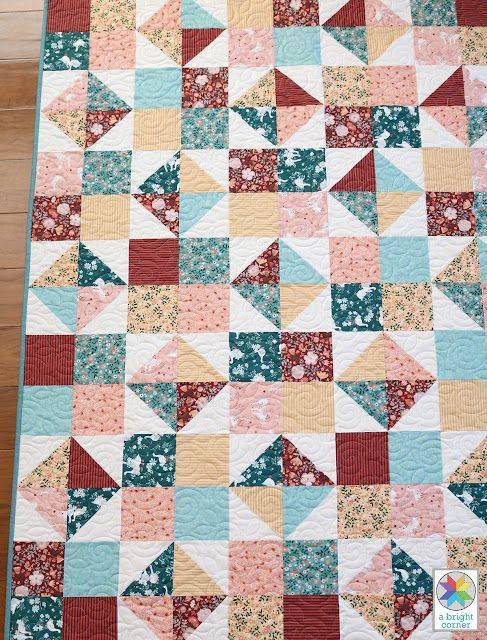 Geometric Four-Patch Spin Quilt Design