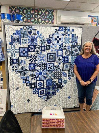 Intricate Blue and White Patchwork Heart Quilt