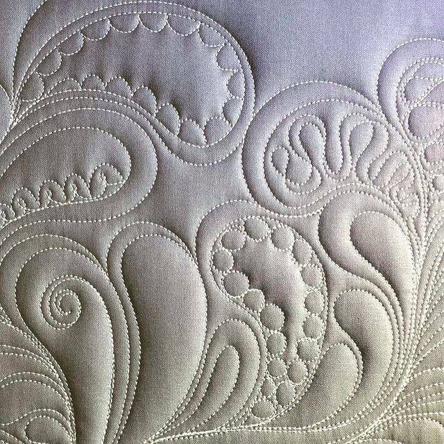 Intricate Feather Quilt Stitching Detail