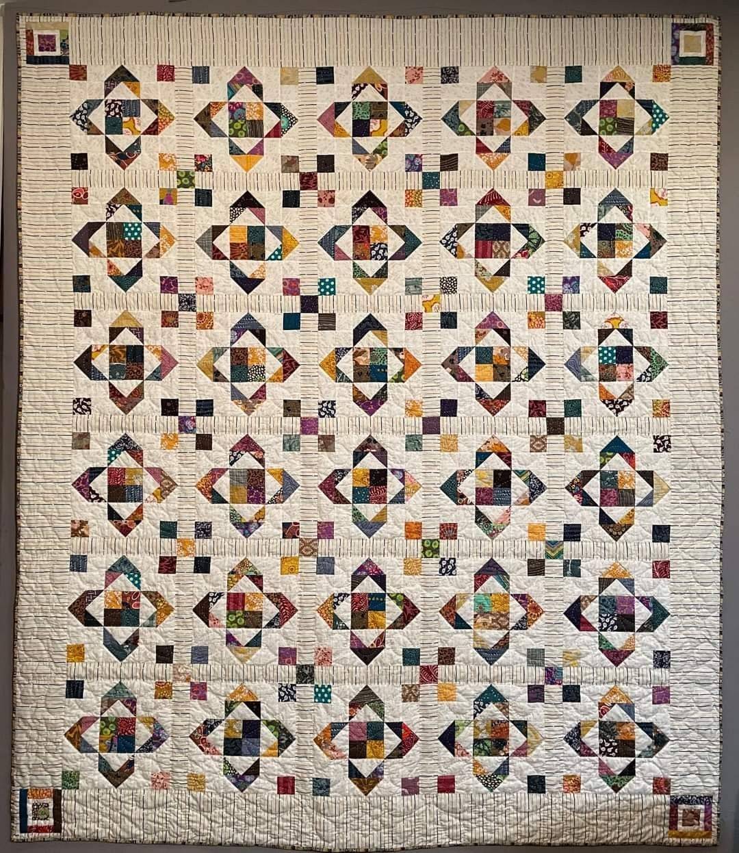 Intricate Patchwork Quilt with Geometric Blocks