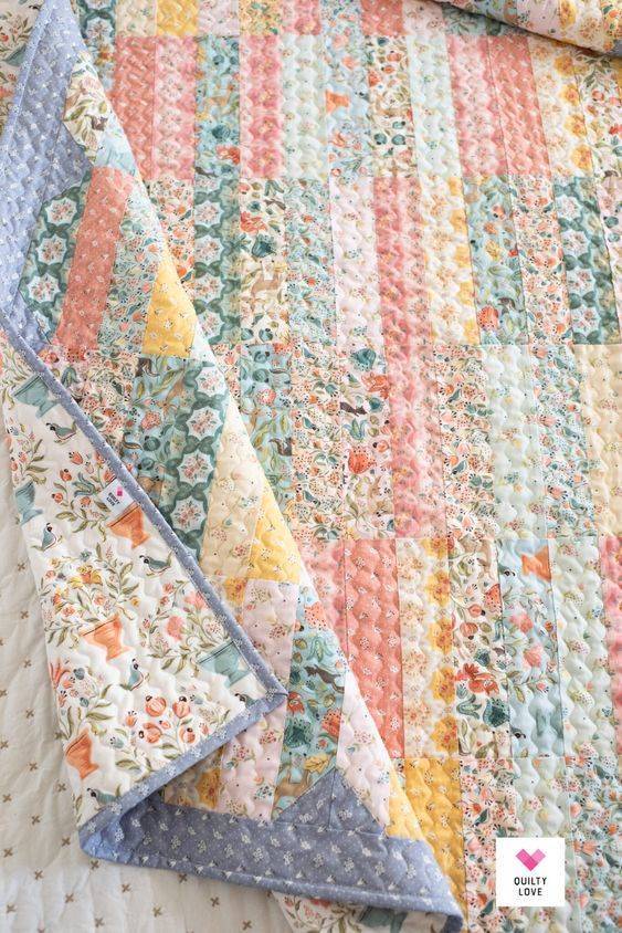Striped Patchwork Quilt with Floral Accents