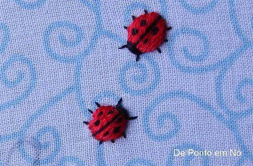 Tiny Embroidered Ladybugs on Blue Swirl Fabric