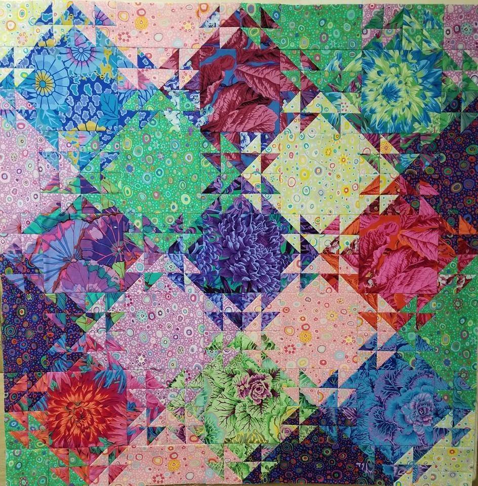 Vibrant Floral Triangle Patchwork Quilt