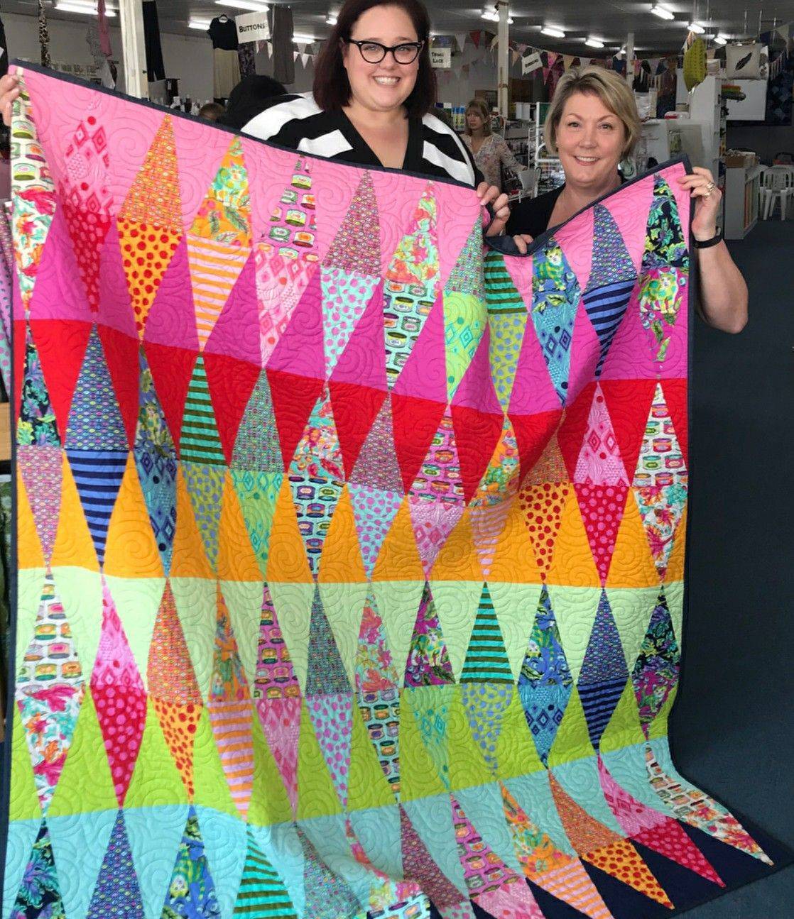 Vibrant Geometric Triangle Quilt