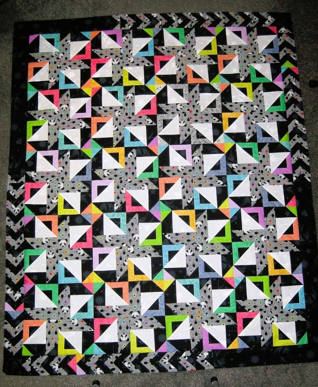Vibrant Geometric Tula Pink Triangle Quilt