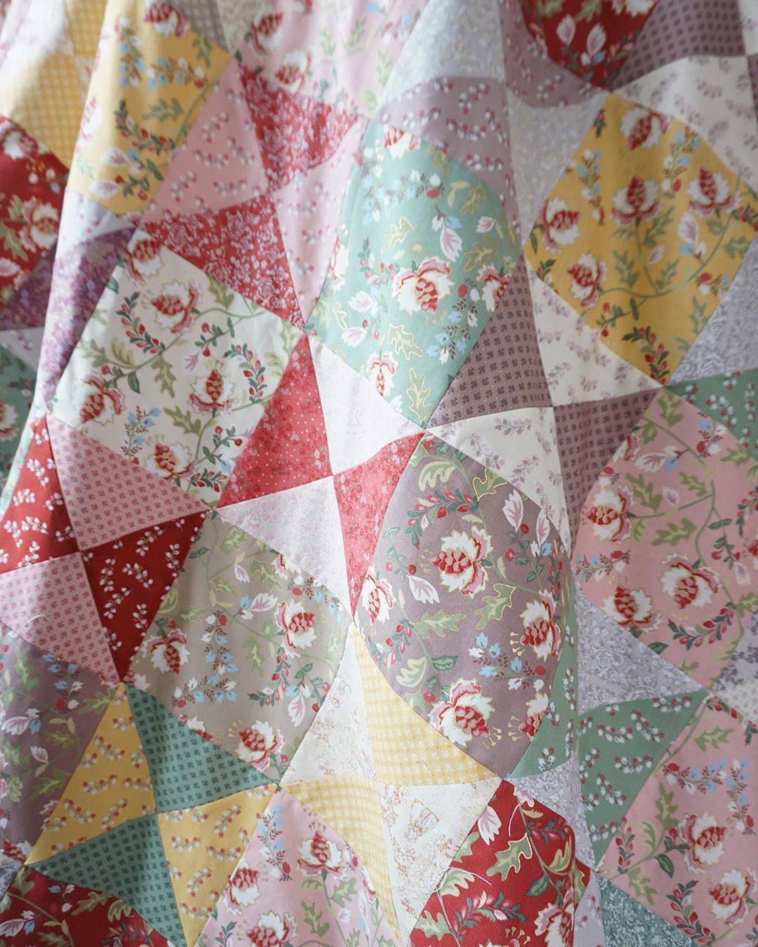Whimsical Floral Patchwork Quilt