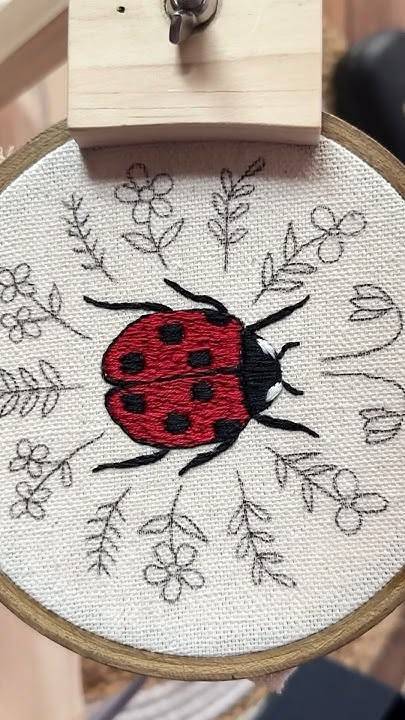 Whimsical Ladybug and Floral Embroidery Hoop Art