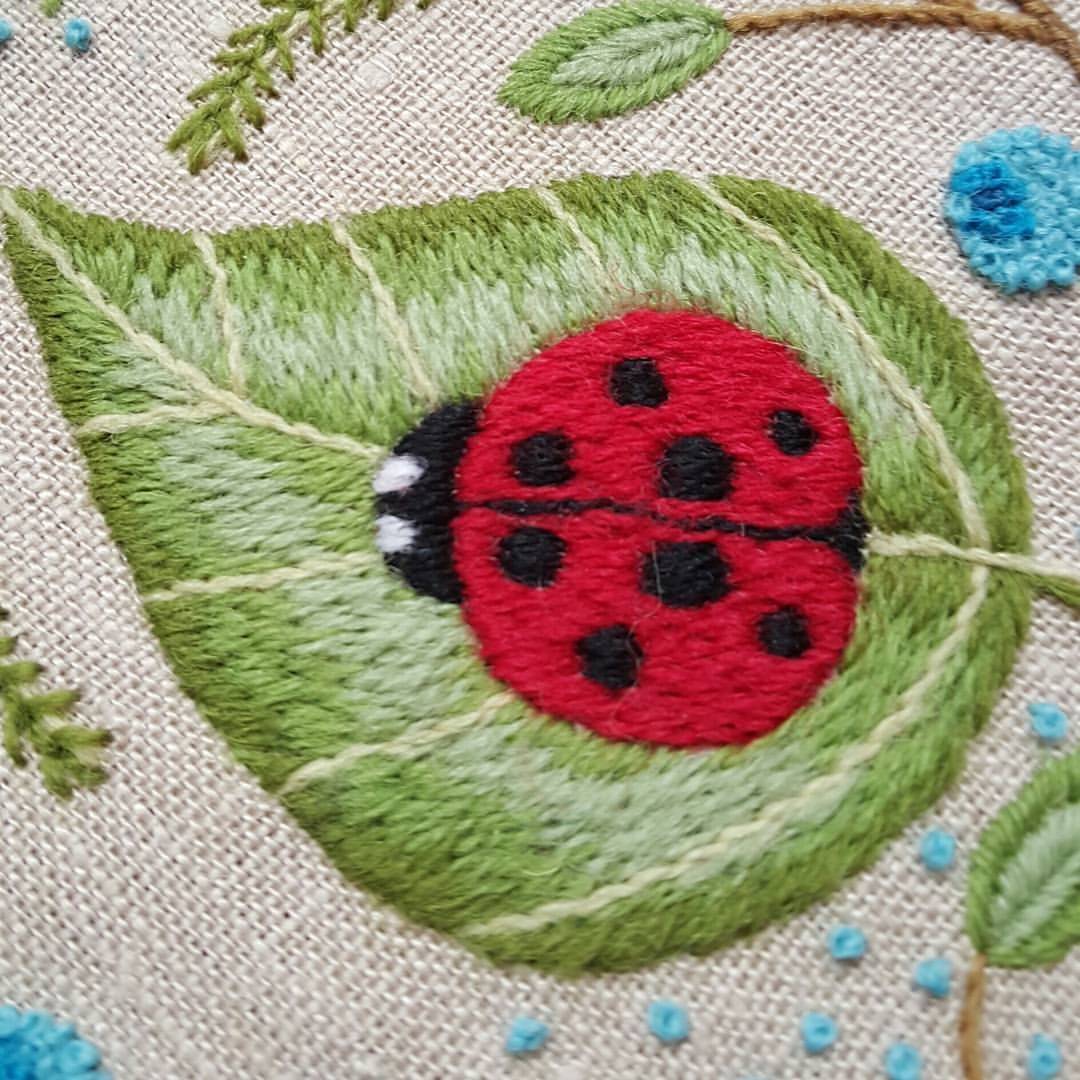 Whimsical Ladybug and Leaf Embroidery Art