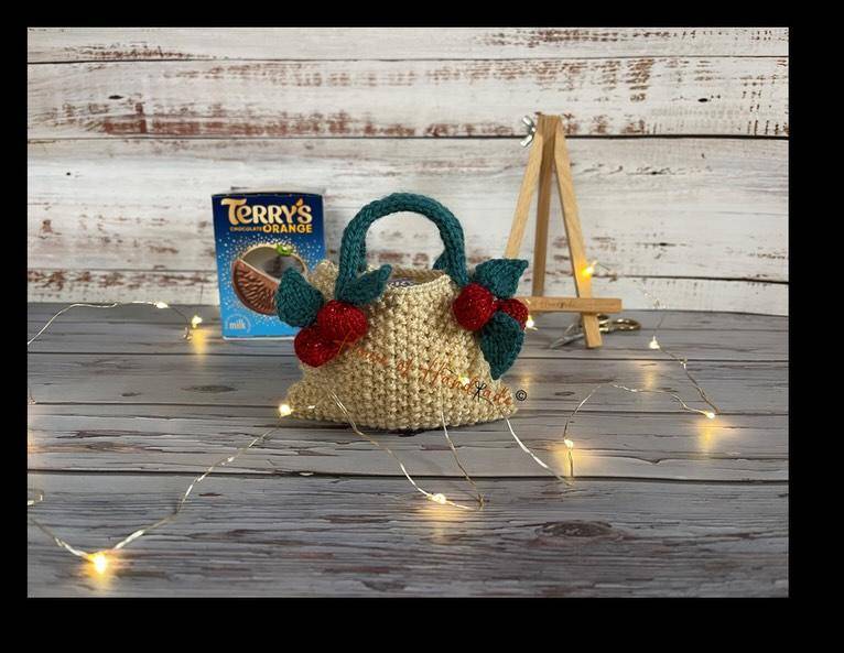 Charming Crocheted Chocolate Orange Holder with Festive Accents