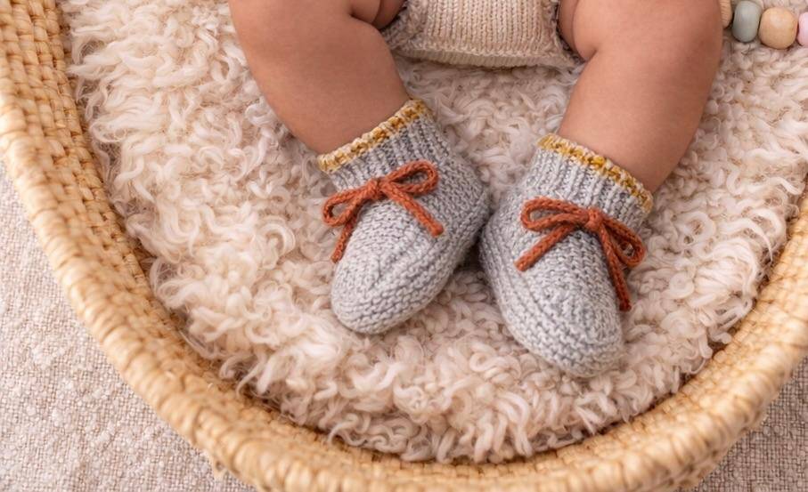 Cozy Ribbed Knit Baby Booties with Bow Detail