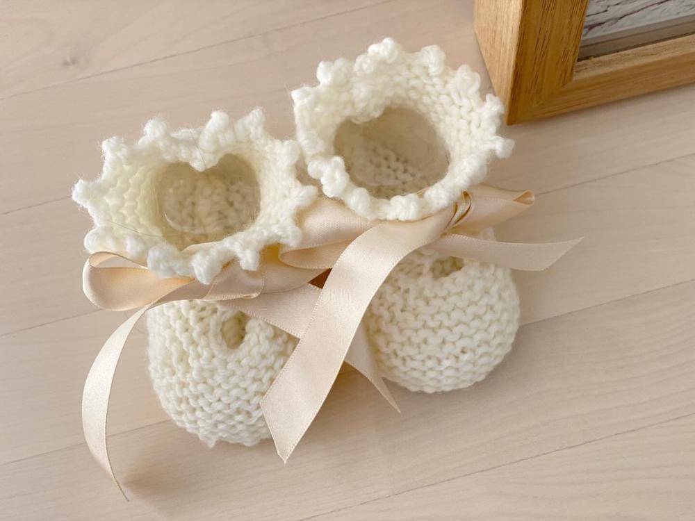 Creamy White Knit Baby Booties with Ruffled Edges