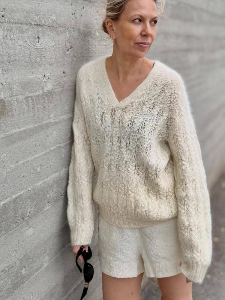 Elegant V-Neck Knitted Sweater with Leaf Motif