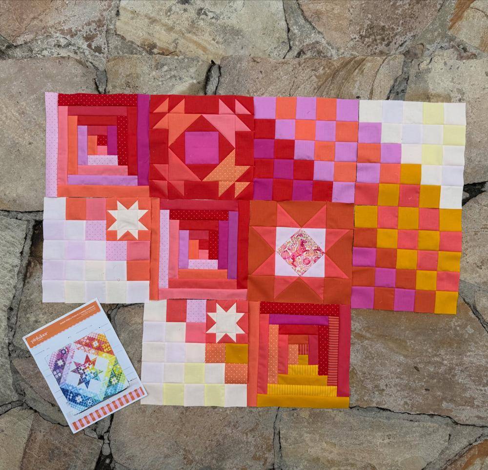Log Cabin and Star Quilt Blocks in Warm Hues