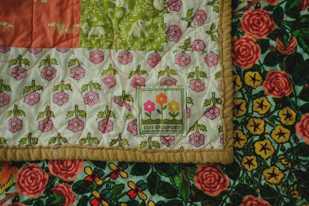 Patchwork Quilted Throw with Floral Accents