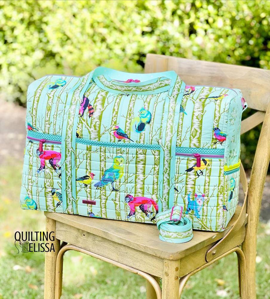 Quilted Travel Bag with Whimsical Bird and Tree Print