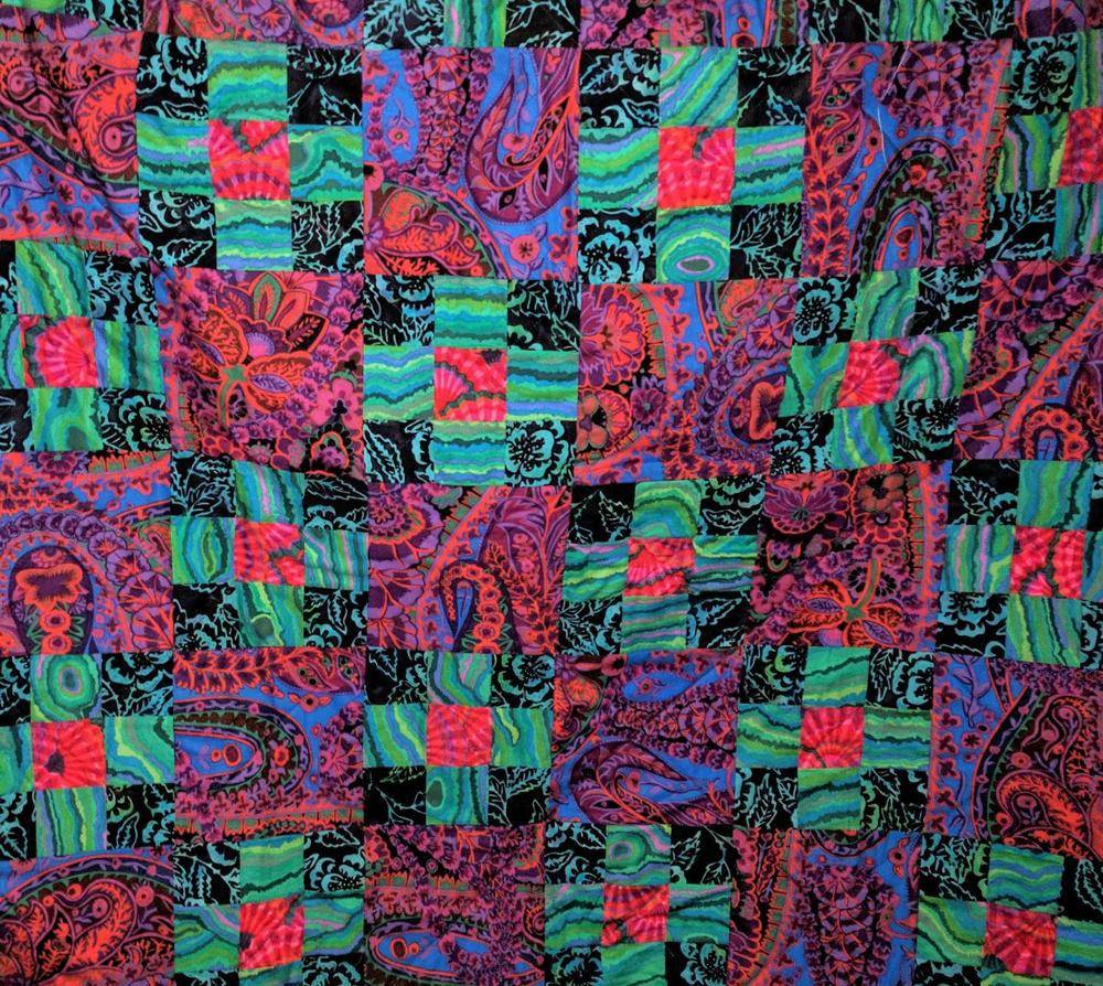 Vibrant Patchwork Quilt with Bold Paisley and Geometric Prints