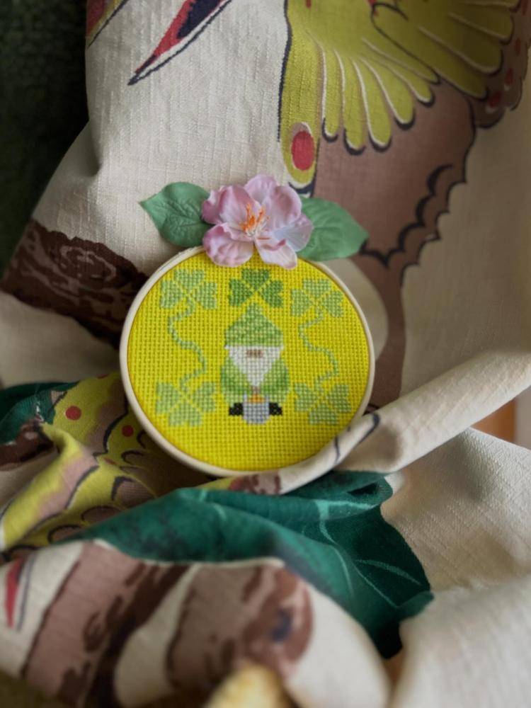 Whimsical Cross Stitch Gnome with Clover Accents
